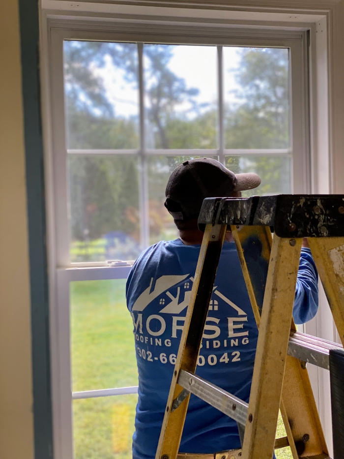 Removing window trim, preparing for new window replacement
